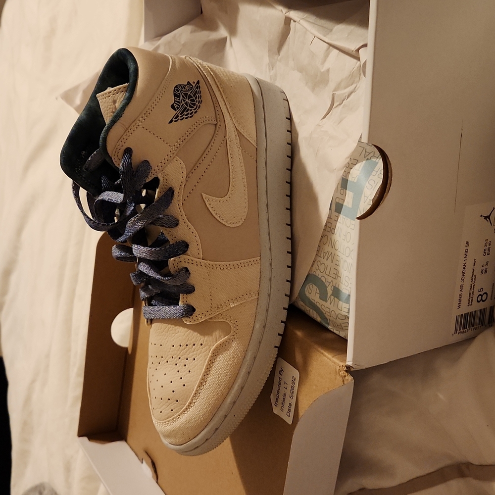 Womens aj1 mid in cream color.